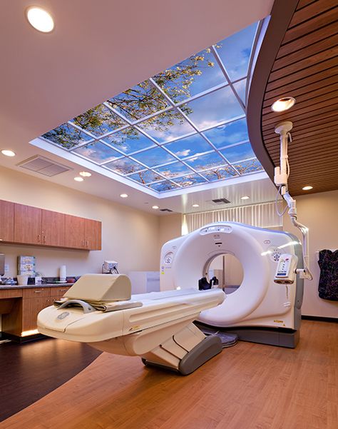 Sutter Diagnostic & Women's Imaging in Roseville, CA, create a patient-centered, spa-like atmosphere with biophilic design elements like warm wood grain surfaces and illusory skies that engage spatial perception. Hospital Design Architecture, Healthcare Interior Design, Medical Office Design, Hospital Architecture, Healthcare Architecture, Hospital Interior, Clinic Interior Design, Dental Office Design, Hospital Interior Design