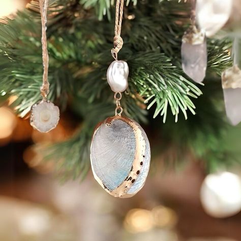 🐚✨ Let your creativity shine as you design the perfect boho-style Christmas tree with our unique selection of handcrafted ornaments.🎄✨ #christmas #seashells #gemstones #crystal #christmasornaments Christmas Tree Crystal Ornaments, Christmas Seashells, Christmas Tree Crystal, Nostalgic Christmas, Handcrafted Ornaments, Crystal Ornament, Ornaments Christmas, Boho Style, Sea Shells