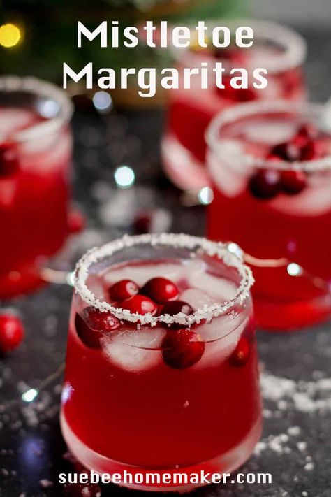 Mistletoe Margaritas combine silver tequila, Cointreau, cranberry juice, fresh lime juice, and simple syrup. These delicious margaritas make the most amazing party cocktails, and add the perfect sparkle to your holiday spread! Mistletoe Margaritas, Friday Cocktails, Classic Tequila Cocktails, Holiday Margaritas, Pure Cranberry Juice, Cocktail Inspiration, Cranberry Margarita, Cranberry Juice Cocktail, Best Tequila