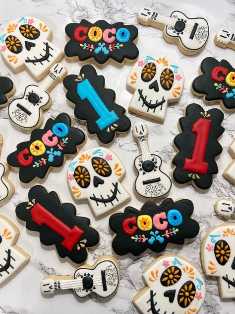 coco first birthday cookies #cocomovie #cococookies #cookies #sugarskull #sugarskullcookies #coco #disney #disneycookies #guitarcookies #firstbirthdaycookies #birthdaycookies Coco Bday Party Ideas, Coco Cookies Decorated, Coco Centerpiece Ideas, Coco Birthday Party Ideas For Boys, Coco Party Decorations, Coco Party Ideas, Coco Birthday Cake, Disney Coco Birthday Party, Coco Themed Birthday Party