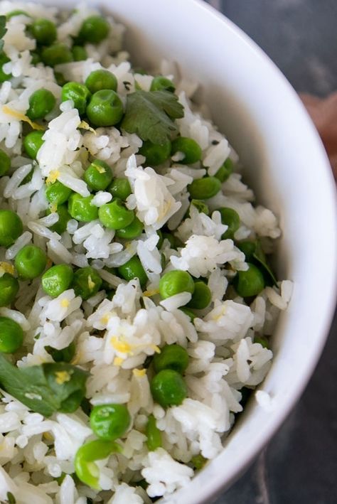 🌸Spring Jasmine Rice with Peas is the perfect accompaniment to any main course.  It is fresh, pretty and utterly delicious.  It's a natural to pair with Baked Coconut Shrimp! It's so simple to make.  Simply cook the jasmine rice as the package recommends. Once cooked, add peas, lemon zest, herbs, garlic and butter.  Fluff it with a fork to combine it.  That's it!🌱🍃 Rice With Peas Recipes, Dinner Ideas With Jasmine Rice, Recipes For Jasmine Rice, Healthy Jasmine Rice Recipes, Flavorful Jasmine Rice Recipes, Jasmine Rice Side Dish Recipes, Peas And Rice Recipe, Savoury Rice Recipe, Rice Recipes For Kids