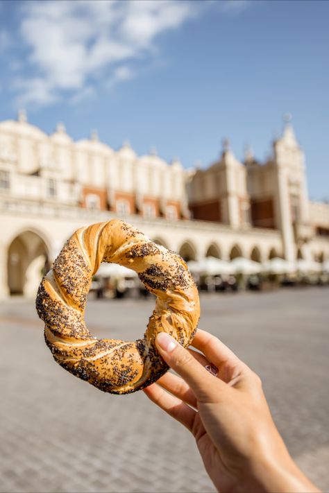 When you visit Krakow, you definitely want to try something local. Tourists love many regional dishes. In this article, you will find out what Krakow Bagel is, learn about its history, and we will show you where to get this tasty snack.🥨🥐 #Kraków #Poland #travel #food #obwarzanek Krakow Aesthetic, Poland Aesthetics, Polish Core, Travel 2025, Goals 2025, Krakow Travel, Poland Food, Poland Krakow, Best Bagels