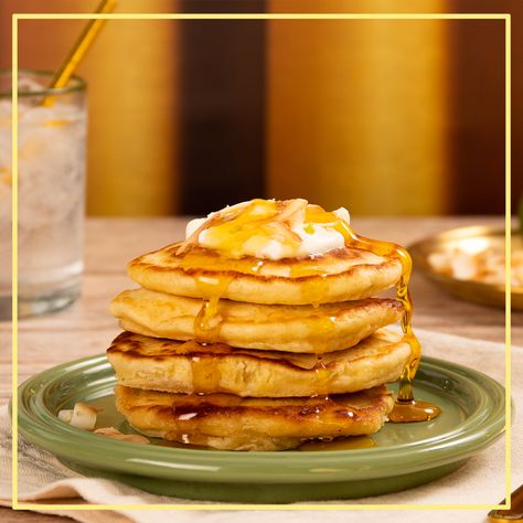 Pancakes stacked so high they've found a little cloud of heaven... and is that cloud? YES! It's raining Lyle's Golden Syrup! 

Zingy, creamy and smothered in delusciously sweet syrup, these coconut and lime pancakes are fluffier than a heavily permed cumulus cloud. Lime Pancakes, Cumulus Clouds, Pancake Stack, Golden Syrup, Coconut Lime, Lime Zest, It's Raining, Sweet Taste, Melted Butter