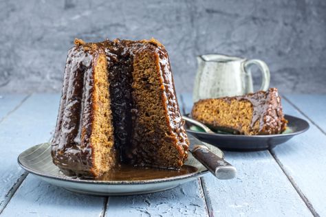 Old English Sticky Toffee Pudding is an indulgent, moist, date-infused sponge cake and covered in a rich toffee sauce.  It’s an impressive dessert that’s easy to make.  It’s sure to become a family favorite. How many times have you sung “We Wish You A Merry Read More.. The post Old English Sticky Toffee Pudding appeared first on Eats by the Beach. English Sticky Toffee Pudding, Sticky Pudding, Buttermilk Biscuit, Banana Fritters, Bakewell Tart, Impressive Desserts, Lemon Drizzle Cake, Drizzle Cake, Toffee Pudding