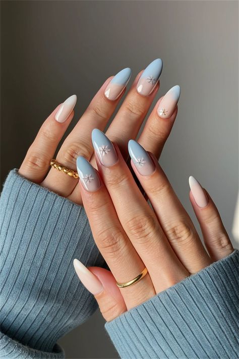 Embrace the beauty of Winter with these simple nail ideas that perfectly reflect the season's charm. Try a minimalist design featuring soft, icy blue polish paired with delicate white snowflakes or silver glitter tips. This chic yet understated look will elevate your winter wardrobe and keep your nails stylish and fresh. Perfect for cozy nights in or festive gatherings! Explore more winter-inspired designs and share your favorite. Light Blue Nails With Silver Design, Simple Nail Ideas, Cozy Winter Vibes, Glitter Tips, Light Blue Nails, Blue Polish, Winter Inspired, Blue Nail Designs, Winter Vibes