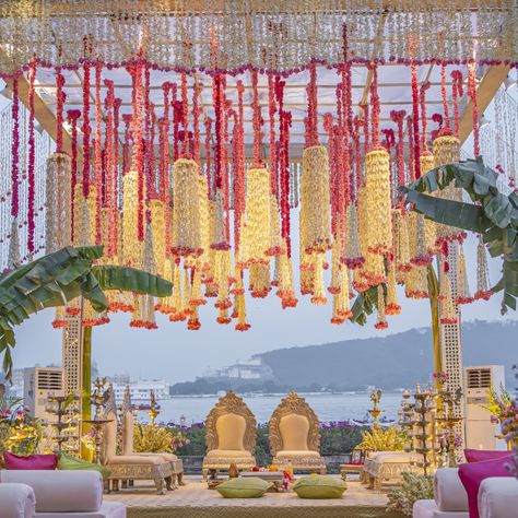 A love story painted in pink, white and gold💕🤍 As the sun sets, our mandap glows with the warmth of love and the beauty of nature. Here's to forever under the golden sky✨ . Design- @melabysurabhi Planner- @anewknot Florals- @fragranceflowerz Venue- @theoberoiudaivilas . . . . . [Fragranceflowerz, Wedding, Decor, Royalwedding, Explorepage, Magic, Dreamwedding, Destination, Love, Luxurywedding, Mandap, Mandapdecor, Florals] Floral Mandap, Mandap Design, Golden Sky, Mandap Decor, Sun Sets, A Love Story, Event Management, Wedding Season, A Love