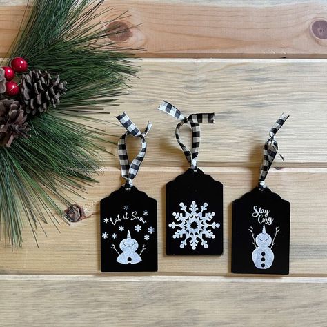 These hand-stenciled wood tag ornaments are a perfect touch of rustic farmhouse charm. Available in a set of 3, they can used as gift tags, ornaments, or tiered tray decor.  We live in Colorado and this is how we decorate our home because this is our life in the winter!  Bring a little bit of Colorado to your home! Wood Tag Ornaments, Ornament Favors, Wood Gift Tags, Tag Ornaments, Cabin Christmas Decor, Wooden Gift Tags, Christmas Craft Show, Ornament Tags, Cabin Christmas