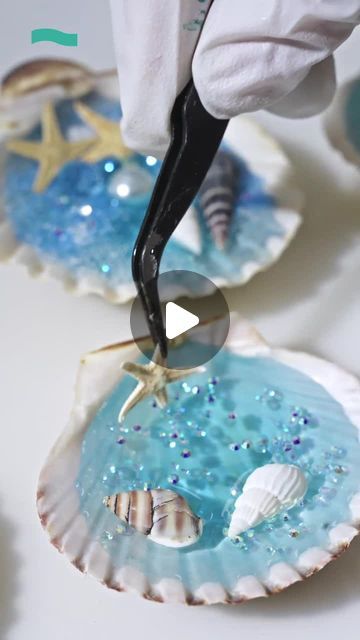 Resiners on Instagram: "🌊✨ Bringing the ocean’s beauty into our craft! We’ve combined delicate shells with shimmering resin to create a unique, mini masterpiece. Perfect for adding a touch of coastal charm to any space! 🐚💙 #Resiners #ResinArt #HandmadeWithLove #CraftRave" Resin Shell Crafts, Resin Ornament Ideas, Resin Seashell Crafts, Beach Resin Art, Resin Ocean Art, Resin Christmas, Coastal Charm, Seashell Crafts, Shell Art