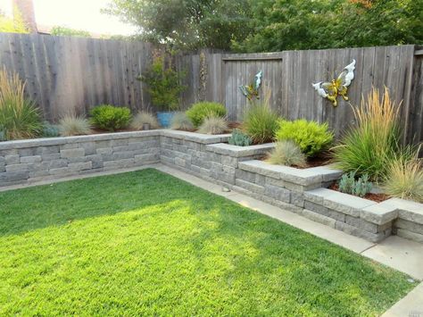 Staggered Garden Ideas, Retaining Wall With Planter Boxes, Raised Planters Against Fence, Stone Wall Border Garden, Stone Flower Bed Border Retaining Walls, Stone Planter Boxes Retaining Walls, Stone Planters Front Yard, Backyard Planters Along Wall, Brick Wall Planters Outdoor