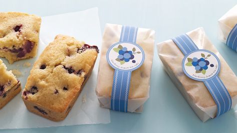 Blueberry-Lemon Tea Cakes | With juicy berries and zesty lemon, these tiny cakes pack big flavors. For a blue-ribbon presentation, print these gift labels and attach to wax paper-wrapped loaves. #food #recipes #marthastewart #cakes #cakerecipes Lemon Tea Cake, Tiny Cakes, Cake Packaging, Homemade Baby Foods, Mini Loaf, Lemon Tea, Homemade Baby, Lemon Blueberry, Loaf Pan