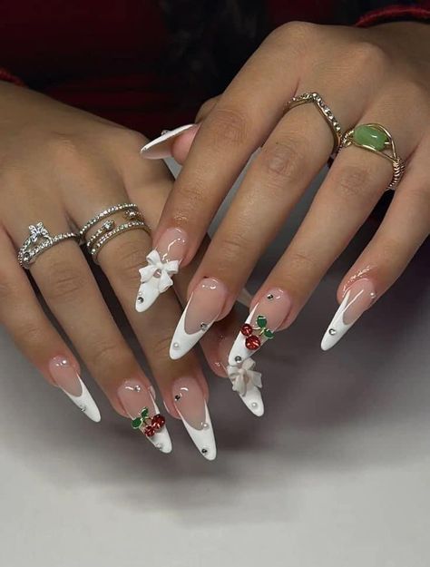 Cherry Nails With Gems, Long Almond Nails With Gems, Almond Shape Nails Christmas, Cherry Gem Nails, Cute Almond Christmas Nails, Long Almond Christmas Nails, Stiletto Nails With Charms, Almond Nails Cherry, Cherry Charm Nails