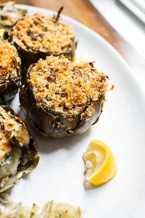 Are you ready to take your artichoke experience to a whole new level? 🌟 Try our Easy Italian Stuffed Artichoke recipe for a scrumptious and fun twist on a classic dish! Packed with flavor, you won't be able to resist these tasty little bites. Don't wait, get the recipe now! 😋 How To Make Stuffed Artichokes, Stuffed Artichoke Recipes Italian, Stuffed Artichokes Italian, Fried Artichokes Italian, Baby Artichoke Recipes, Italian Stuffed Artichokes, Stuffed Artichokes Italian Bread Crumbs, Italian Appetizers Easy, Artichoke Recipe