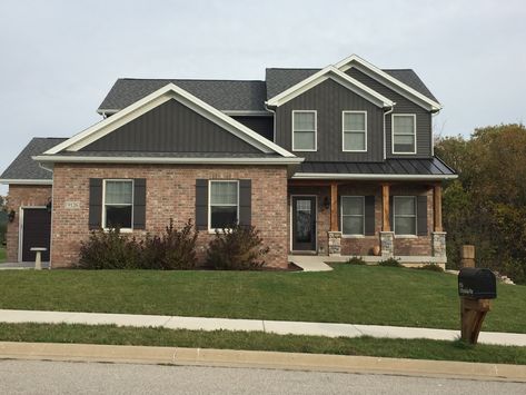 certainteed-landmark-pewter-grey-roof ... Dark Grey Siding, Red Brick House Exterior, Red Brick Exteriors, Metal Roof Houses, Grey Siding, Vertical Siding, Light Brick, Home Exterior Makeover, Red Brick House