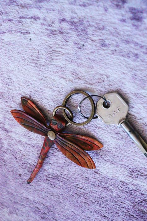 Dragonfly keychain template You can use it as a key chain, bag ornament, buckle, earring, handmade collectible, handmade gift. Leather Dragonfly PDF PATTERN , DIY Read before you buy! THIS IS A DIGITAL DOWNLOAD, not a physical item! You can see the finished product samples in the product photos. For yourself and your loved ones. How To: A step-by-step photo list will help you after purchase. Leather Dragonfly keychain Size: 95mm*95mm - 3,74 inç*3,74 inç - 9,5cm*9,5 cm -- Dragonfly Character, Leather Dragonfly, Keychain Template, Leathercraft Projects, Dragonfly Keychain, Dragonfly Pattern, Keychain Pattern, Keychain Purse, Leather Craft Projects