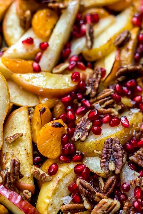 These Spiced Baked Apples, Pears and Mandarins topped with Pecans and Pomegranate are a simple vegan dessert or topping. In less than 15 minutes you can have a fresh and flavorful fruit topping for yogurt, oatmeal or cheesecake. This roasted fruit is good enough to eat on its own. This recipe is vegan, Paleo, dairy free and gluten free. Spiced Fruit Bake, Vegan Fruit Dessert Recipes, Roasted Fruit Dessert, Vegan Fruit Recipes, Winter Fruit Desserts, Vegan Fruit Dessert, Hot Fruit Bake, Baked Fruit Recipes, Fruit Casserole