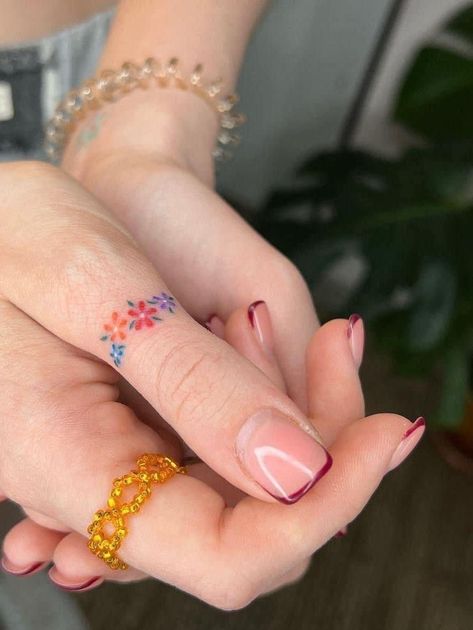 Unique Rainbow Tattoo, Colorful Dainty Tattoos, Tiny Color Tattoos, Colorful Hand Tattoos, Cute Color Tattoos, Flower Ring Tattoo, Finger Flower Tattoo, Confetti Tattoo, Small Colorful Tattoos