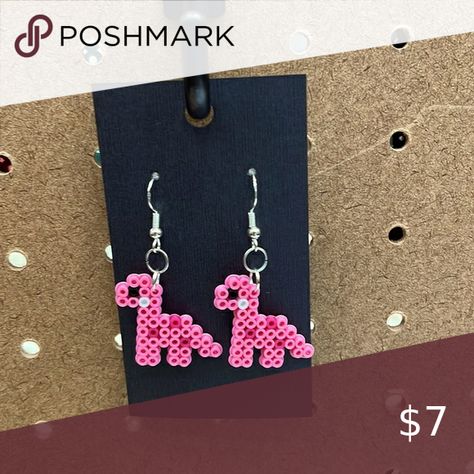 Dinosaur perler bead earrings Pixel Bead Earrings, Pixel Art For Perler Beads, Melted Bead Earrings, Iron Beads Jewelry, Melt Bead Earrings, Peeler Bead Earring Holder, Melting Bead Earrings, Peeler Bead Jewelry, Iron Beads Earrings