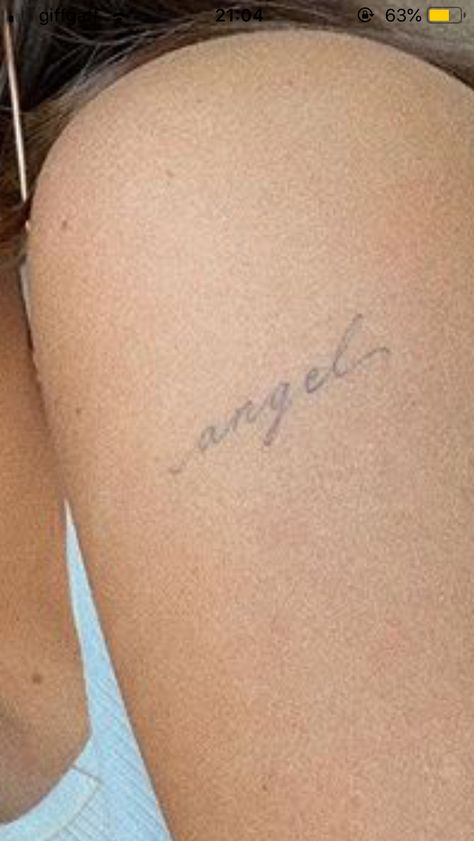 Angel Tiny Tattoo, Angel In Cursive Tattoo, Angel Tattoo Dainty, Angel Script Tattoo, Angel Cursive Tattoo, Angelic Tattoos For Women, Angel Tattoo Aesthetic, Word Angel Tattoo, Mini Angel Tattoo