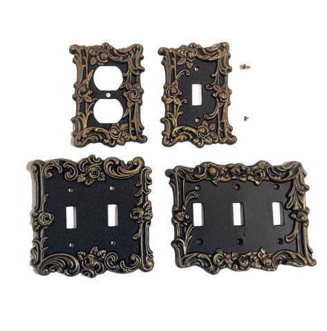 🖤DESCRIPTION: Gorgeous antique switch covers turned Gothic with black and gold.  A vintage brass switch cover has been painted flat black and then accented with European Gold metallic wax.  The switch plate has been covered in a top enamel coat. Each cover will come with the appropriate screws. CHOOSE OPTIONS UNDER VARIATIONS. 🖤DIMENSIONS: A - 2 hole outlet cover - Height - 5" x Width - 3 1/4" B - single light switch cover - Height - 5" x Width - 3 1/4" C - double light switch cover - Height - Gothic Light Switch Covers, Victorian Light Switches, Gold Light Switch Cover, Whimsy Goth House Decor, Antique Light Switch, Black Light Switches, Antique Fixtures, Black And Gold Decor, Gothic Homes