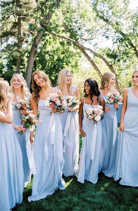 Bridesmaids in Blue Dresses with Bouquets, Outdoor Pic; shared by Buchwald Jewelers Miami, the premier fine jewelry and engagement ring store #bridesmaids #bridesmaidsdresses #bridesmaidsflowers #bridesmaiddress #weddingbluedresses #bluedressbridesmaids Something Blue Wedding Ideas, Shades Of Blue Wedding, Blue Wedding Colour Theme, Brides Maid Dresses Blue, Light Blue Wedding Colors, Wedding Colour Theme, Bridesmaids Blue, Blue Wedding Ideas, Light Blue Bridesmaid Dresses