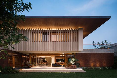 Dhsac Residence / Bitte Design Studio | ArchDaily South Jakarta, Tropical Architecture, Floating Stairs, Timber Panelling, Wooden Ceilings, Tropical House, Modern Tropical, Tropical Houses, Traditional Architecture