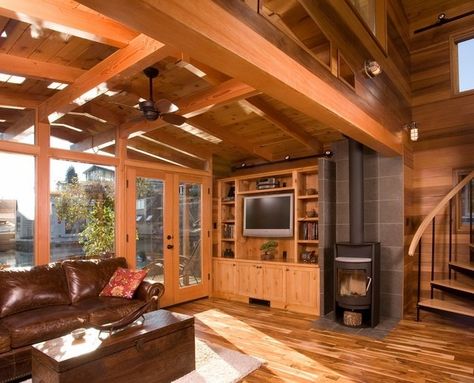 eco friendly heating ideas pellet rustic interior design Corner Wood Stove, Wood Stove Surround, Wood Stove Hearth, Acacia Wood Flooring, Rustic Family Room, Contemporary Family Room, Freestanding Fireplace, Tiny House Movement, Floating House