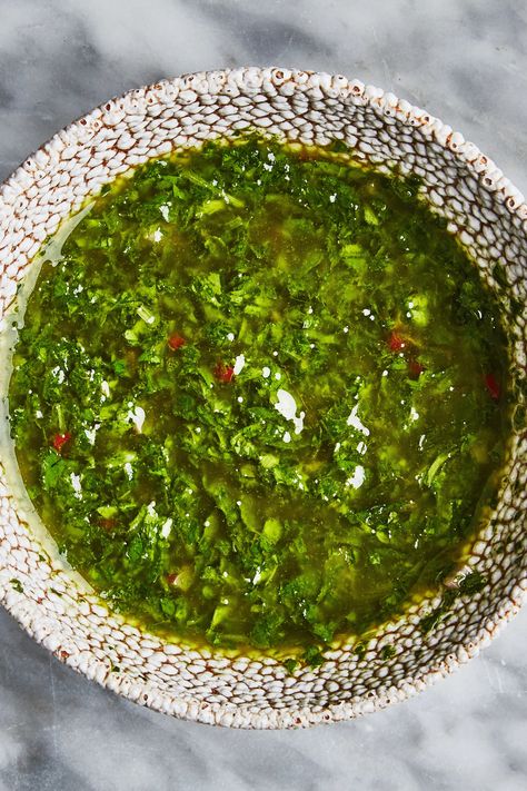 This is our favorite chimichurri recipe. Fresh oregano, parsley, and cilantro come together with red wine vinegar for a punchy condiment that’s as good spooned over a grilled steak as it is drizzled on a bowl of lentils (it’s also an excellent marinade). It's best served just after it’s made, but if you have any left over, it will hold in the refrigerator for a few days. Use on roasted chicken, grilled tofu, oven-roasted potatoes, fried eggs, or almost anything else that’s simply seasoned. Aji Recipe, Columbian Recipes, Colombian Style, Chimichurri Sauce Recipe, Chimichurri Recipe, Beef Empanadas, Colombian Food, Easy Dips, Chimichurri Sauce