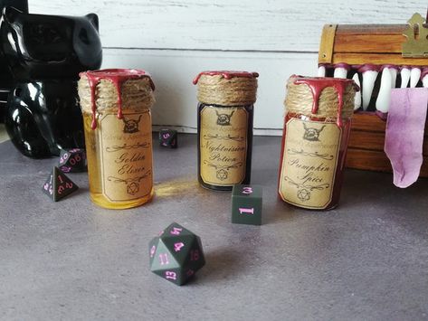 How to make floating dice potions - A recipe for dice roller potions! – rollforcreativity D20 Potion Bottle, Dice Potion Bottle Diy, Dungeons And Dragons Crafts Diy Projects, Floating Dice Potion, Dice Potion Bottle, Dnd Potions Diy, Diy D&d Gifts, Dnd Gifts Diy, D&d Crafts