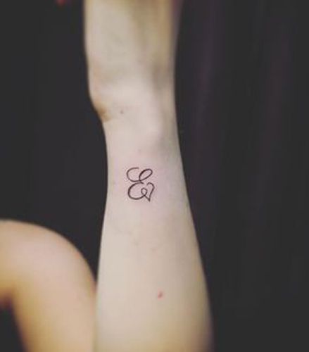 Expressive E Letter Tattoo E Letter Tattoo, Tattoo Ghost, Fonts For Tattoos, Monogram Tattoo, Meaningful Wrist Tattoos, E Letter, Letter Tattoo, Initial Tattoo, Pretty Tattoos For Women