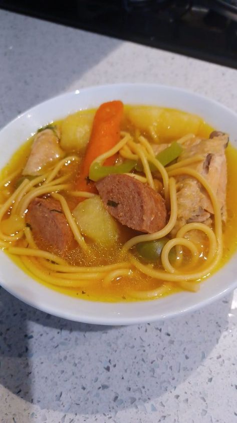 Puerto Rican Food with Recipes | Sopa de Salchichón | Facebook Puerto Rican Chicken Noodle Soup, Puerto Rican Chicken Soup, Puerto Rican Stewed Chicken, Puerto Rican Chicken Soup With Rice, Puerto Rican Soup Salchichon, Authentic Puerto Rican Sancocho, Spanish Soup Puerto Rico, Chicken Francaise Recipe, Puerto Rican Chicken