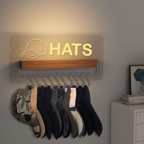 PRICES MAY VARY. Aesthetically Pleasing and Practical: Made with acrylic and wood materials, this hat organizer is both durable and stylish. It not only stores your hats, but adds a sleek and modern look to your home LED Lighting: This hat organizer features warm white LED lighting that adds a cozy and inviting ambiance to any space. The gentle glow makes finding your favorite hat a breeze USB Powered: This hat organizer comes with a USB data cable, making it easy to power and use wherever you n Hat Wall Display Men Mudroom, Hat Collection Wall, Basbeall Hat Storage, Hat Racks For Kids, Organizing Caps Baseball Hats, Organize Baseball Hats Walmart, Organize Baseball Hats On Wall, Hats Gloves Storage, Hang Ball Hats