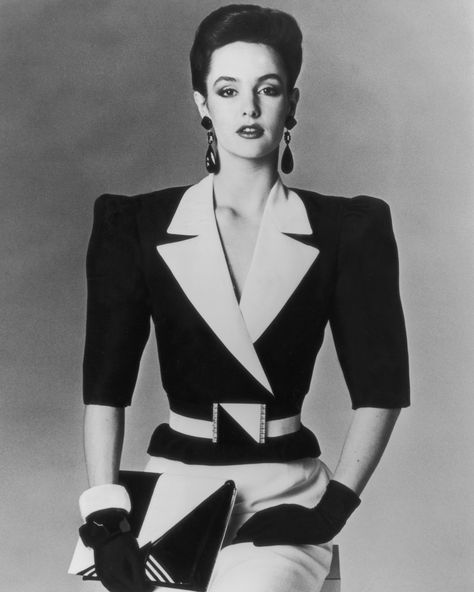 The decade's most prominent silhouette was the one that turned your body into an upside-down triangle. Add a couple giant earrings and a big belt, ... 1980s Fashion Trends, Jean Louis Scherrer, Look 80s, Fashion 1980s, 80s Fashion Trends, 80’s Fashion, New Retro Wave, Fashion 80s, 80s And 90s Fashion