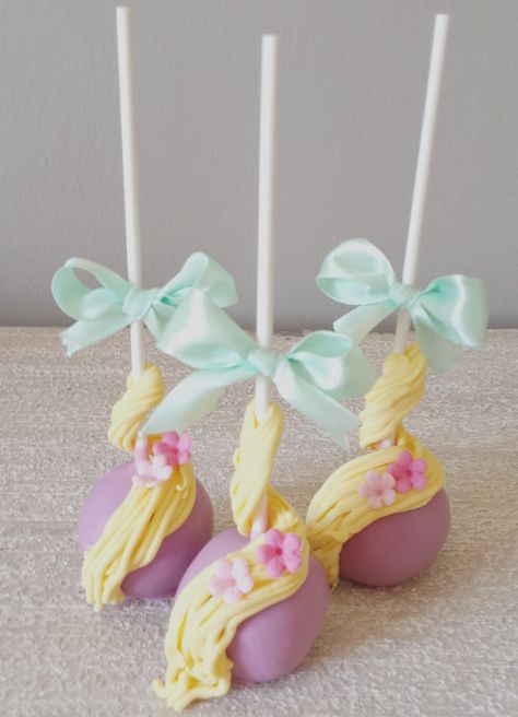 #Rapunzel #Tangled cakepops  https://www.facebook.com/pages/Baked-with-Love/115563808503000?sk=timeline Rapunzel Cake Pops, Rapunzel Torte, Disney Cake Pops, Tangled Cake, Bolo Rapunzel, Rapunzel Cake, Tangled Birthday Party, Rapunzel Birthday Party, Disney Desserts