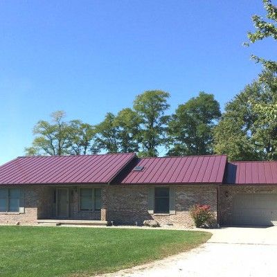 Burgundy Home - Coated Metals Group Houses With Burgundy Metal Roof, Maroon Metal Roof House Colors, Burgundy Metal Roof, Maroon House Exterior, Metal Roof Houses, Exterior Color Palette, Metal Roofs, Standing Seam Metal Roof, Metal Roofing