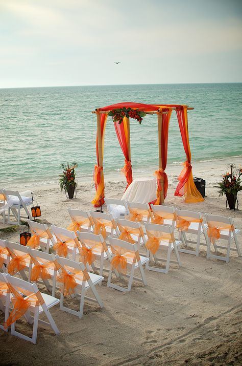 #tropical orange #red beach wedding Orange Beach Wedding, Beach Wedding Tables, Beach Wedding Ideas, Simple Beach Wedding, Beach Wedding Reception, Beach Wedding Guests, Boho Beach Wedding, Beautiful Beach Wedding, Wedding Petals