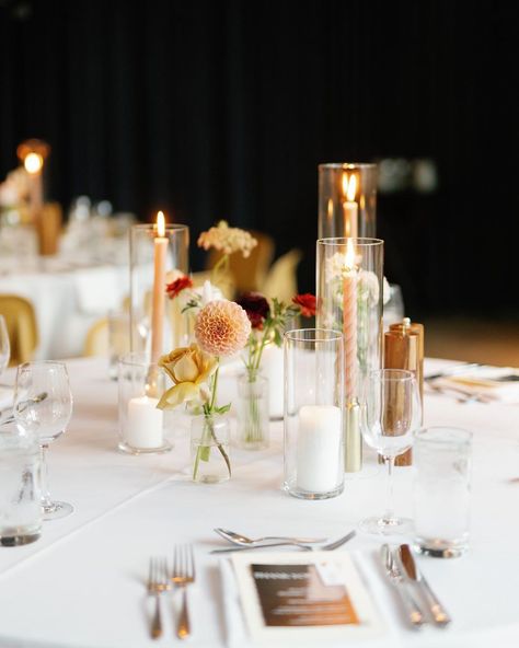 The Farmer & I | Carrington W. on Instagram: “I love the simplicity of some bud vases + taper candles🫶🏻 and the twirly candlesticks ugh I love. captured by @bradybatesphotography for…” Bud Vases Pillar Candles, Mismatched Candles Wedding, Bud Vases And Votives Wedding Centerpiece, Mix Of Pillar And Taper Candles Wedding, Taper Candles In Glass Cylinders, Pillar Candles And Bud Vases, Bud Case And Candle Centerpiece, Single Bud Vase Centerpiece, Fall Wedding Bud Vases