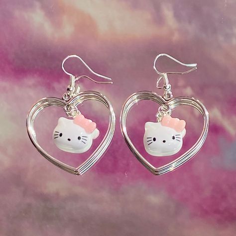 The sweetest handmade kawaii sanrio hello kitty earrings made with silver plated heart hoops and drop hooks Earrings Hello Kitty, Hello Kitty Heart, Story Script, Pretty Items, Hello Kitty Earrings, Hello Kitty Jewelry, Hello Kitty Aesthetic, Anime Jewelry, Indie Jewelry