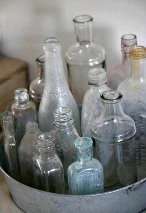 How To Put Collections On Display · Cozy Little House Glass Bottle Collection Display, How To Display Old Bottles, Old Bottle Display Ideas, Display Bottle Collection, Decorating With Old Glass Bottles, Old Glass Bottles Ideas Display, Displaying Bottles Ideas, Jar Collection Display Ideas, Displaying Old Bottles