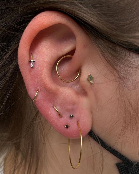 @piercedbyjohn on Instagram: “Started my day off with some stacked lobes and added some gold rings to turn old piercings into something a lil different.” Lobe Stack Piercing, Piercing Both Ears, Stacked Piercings Lobe, Stacked Lobe Piercing Ideas, Triangle Ear Piercing, Stacked Ear Lobe Piercing, Stacked Lobe Ear Piercings, Ear Piercing Stacks, Stacked Ear Piercings