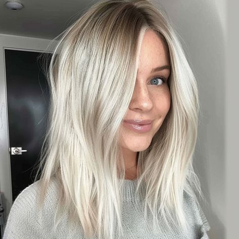 Platinum Blonde with Subtle Shadow Root Platinum Root Shadow, Icy Rooted Blonde, Ash Blonde With Root Shadow, Platinum Hair With Root Smudge, Icy Blonde Long Bob, Bleach Blonde Hair With Shadow Roots, Platinum Blonde Balayage Hair, Platinum Medium Length Hair, Platinum Blonde Medium Length Hair