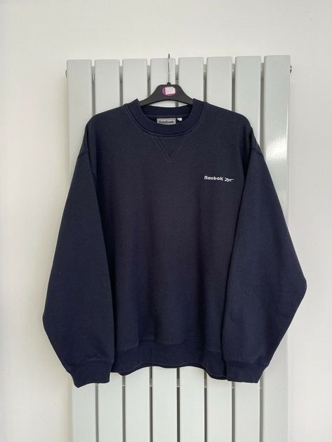 Vintage Navy Reebok Sweatshirt | #vintagereebok #reebok #reeboksweatshirt #vintagereeboksweatshirt #reebokjumper #vintagereebokjumper #reebokcrewneck #vintagereebokcrewneck #reeboksweater #vintagereeboksweater #90sreebok #vintageclothing #vintageclothes #streetwear #vintagestreetwear #stussy #vintagestussy #vintageclothes #vintagestyle #streetwearfashion #90sstreetwear #vintagefashion #90sfashion #streetwearstyle #streetstyle #streetfashion Reebok Clothes, Reebok Sweatshirt, Aesthetic Hoodies, Vintage Nike Sweatshirt, Navy Blue Sweatshirt, Vintage Reebok, Trending Sneakers, Vintage Hoodies, Cute Jackets