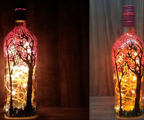 How to Make Blossoming Forest Magic Painting on Wine Bottle with Twinkle Lights |Easy Craft & Art Tutorial Lights In Wine Bottle Diy Craft Ideas, Bottle Painting With Lights, Glass Bottle Lights Diy, Lighted Wine Bottles Diy How To Make, Painted Bottles With Lights, How To Decorate Wine Bottles, Wine Bottle Art Projects, Painting On Bottles Ideas, How To Paint Wine Bottles