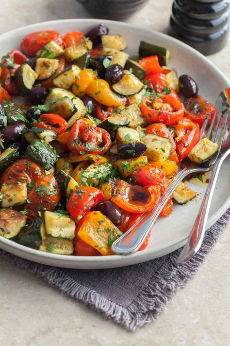 Enjoy the last of summer's produce with this easy and versatile recipe for roasted marinated vegetables. Perfect as a side, salad topping, or in wraps and sandwiches. Roasted Marinated Vegetables, Roasted Vegetable Wrap, Roasted Veggie Wrap, Marinated Vegetable Salad Recipes, Marinated Veggies Salad, Salad Roasted Vegetable, Marinated Greek Vegetables, Marinated Vegetables, Roast Zucchini