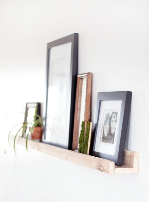 DIY Picture Ledge - The Merrythought Diy Picture Ledge, Photo Shelves, Picture Ledges, Photo Ledge, Wisteria Lane, Shelf Diy, Ideas Decoracion, Picture Ledge, Inexpensive Home Decor