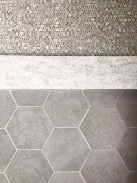 penny tile and hex flooring Penny Tile Combination, Gray Penny Tile Bathroom Floor, Gray White Bathroom Tile, Large Hex Tile Floor, Gray Hex Tile Bathroom Floor, Warm Bathroom Tile Ideas, Unique Bathroom Flooring, Gray Penny Tile Bathroom, Bathroom Floors Ideas Tile