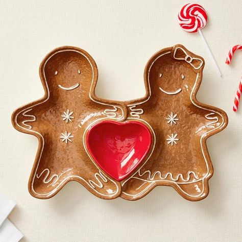 Seasonal treats taste even sweeter served on our vintage-style platter. The glazed, ceramic piece features a cute gingerbread couple conjoined by a red heart and detailed with hand-painted swirls and snowflakes. Dishwasher-safe for easy care, it adds cheery charm to holiday entertaining. DETAILS THAT MATTER Divided platter is made of stoneware. Plate is divided into 3 sections. Features a hand painted glaze finish. Meet FDA requirement. KEY PRODUCT POINTS Pottery Barn Kids decal artwork is exclusive. Sold individually. Top-rack dishwasher safe. Microwave safe. Food safe. Imported. 3 Piece Ceramic Set, Ceramic Advent Calendar, Cool Ceramics Projects, Christmas Pottery Ideas, Handprint Pottery, Food Pottery, Painted Pottery Plate, Food Ceramics, Christmas Ornaments Pottery