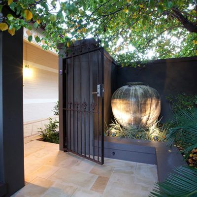 Nedlands Tropical Garden - Cultivart Landscape Design Small Courtyard Garden, Courtyard Garden Design, Gated Entrance, Small Courtyard, Garden Corner, Pallet Garden Furniture, Small Courtyard Gardens, Courtyard Gardens Design, Archi Design