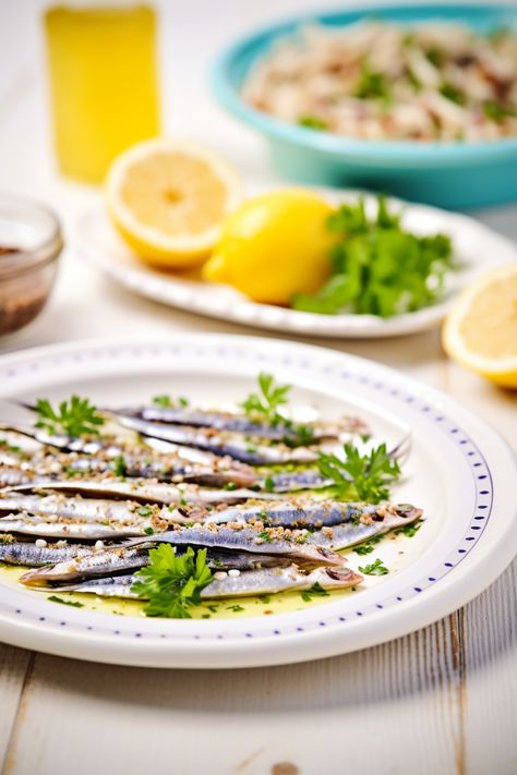 Dive into the flavors of Croatia with our Marinated Anchovies recipe! Fresh, zesty, and ready in 20 mins. Perfect for a healthy, tasty appetizer. 🐟🌿 #CroatianCuisine #MediterraneanDiet #HealthyEats #Anchovies #AppetizerHeaven Anchovy Recipes, Mediterranean Appetizers, Croatian Cuisine, Parsley Recipes, The Mediterranean Diet, Aromatic Herbs, Mediterranean Diet Recipes, Anchovies, Mediterranean Diet