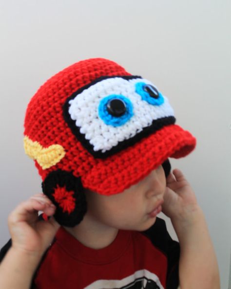 15 Pixar-Inspired Patterns You Need To Crochet Crochet Car Hat, Crochet Lightning Mcqueen Hat Free Pattern, Crochet Baby Mittens, Crochet Character Hats, Car Hat, Crochet Kids Hats, Crochet Car, Crochet Disney, Crocheted Hat