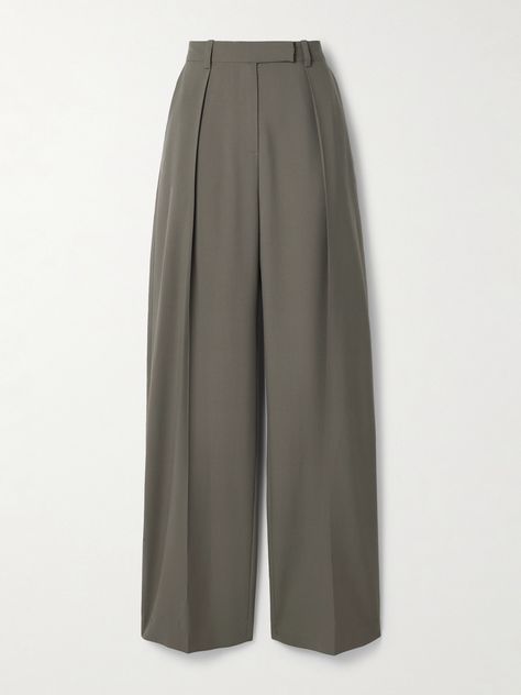 There's just something so chic and cool about a pair of relaxed, tailored pants. SALON 1884's 'Odile' version has been locally made in New York City's Garment District from wool and is pressed with pleats that traced from the high-rise waist through the wide-legs. The 'Cinder' color is endlessly versatile.<br><br>This product was Locally Made. Find out more about NET SUSTAIN <a href="https://www.net-a-porter.com/en-gb/campaigns/net-sustain"&g… High Waist Pleated Pants, Trouser Aesthetic, Luxury Tailored High-waisted Wide Leg Pants, Timeless Wide-leg Tailored Pants, Tailored Wool Wide-leg Pants, Luxury Wool High-waisted Wide Leg Pants, Luxury Wide-leg Wool Pants, Tailor Pants, Pants With Pleats